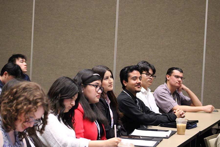 conference attendees at a breakout session 