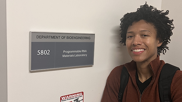 Jaimie Stewart next to her UCLA Department of Engineering lab. (Photo courtesy of Jaimie Stewart)