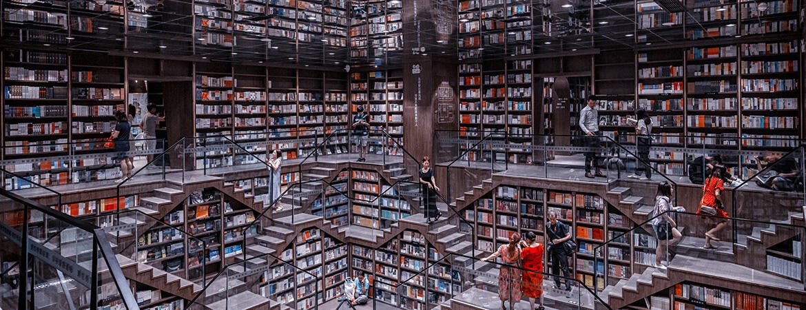 Digital illustration of interior of library containing enormous amount of books.