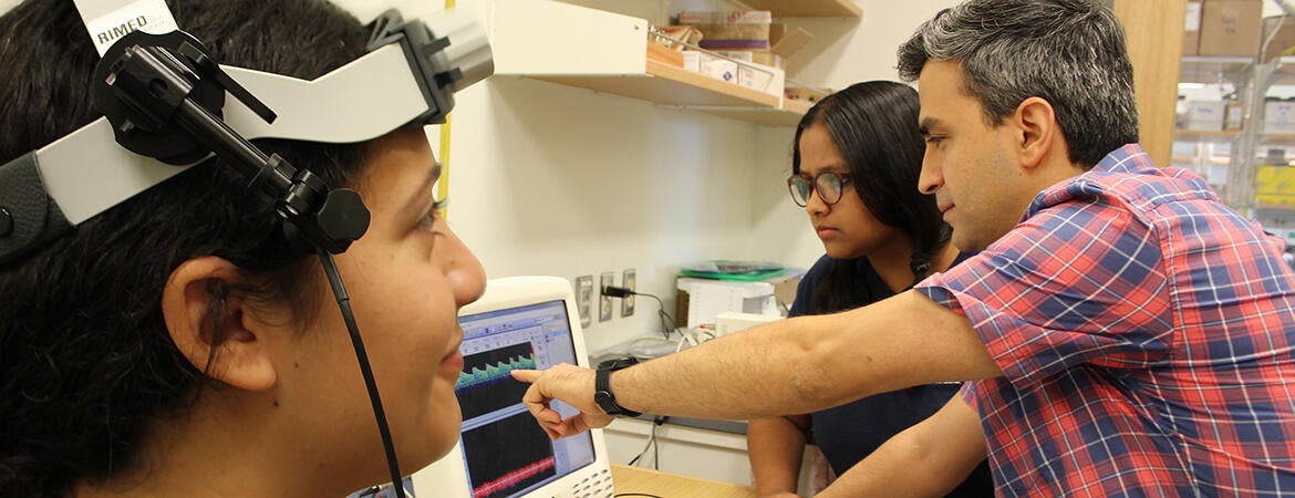 Mechanical Engineering assistant professor Kaveh Laksari conducting brain-trauma research in his lab.