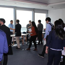 male and female students lined up to check in 