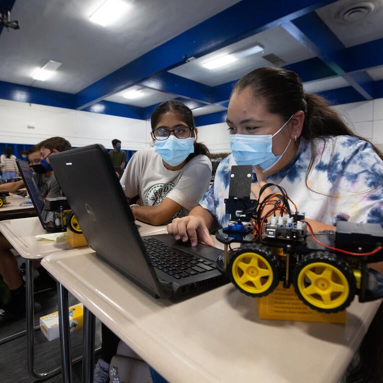 students working on robotics project