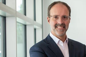 Portrait of Ryan Reid, a BCOE alum and president of Boeing Satellite Systems