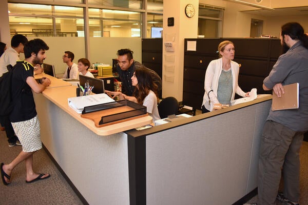 staff members working at desk