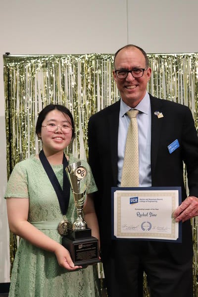 Rachel getting award from Dean Lynch
