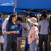 Navya talking with parent
